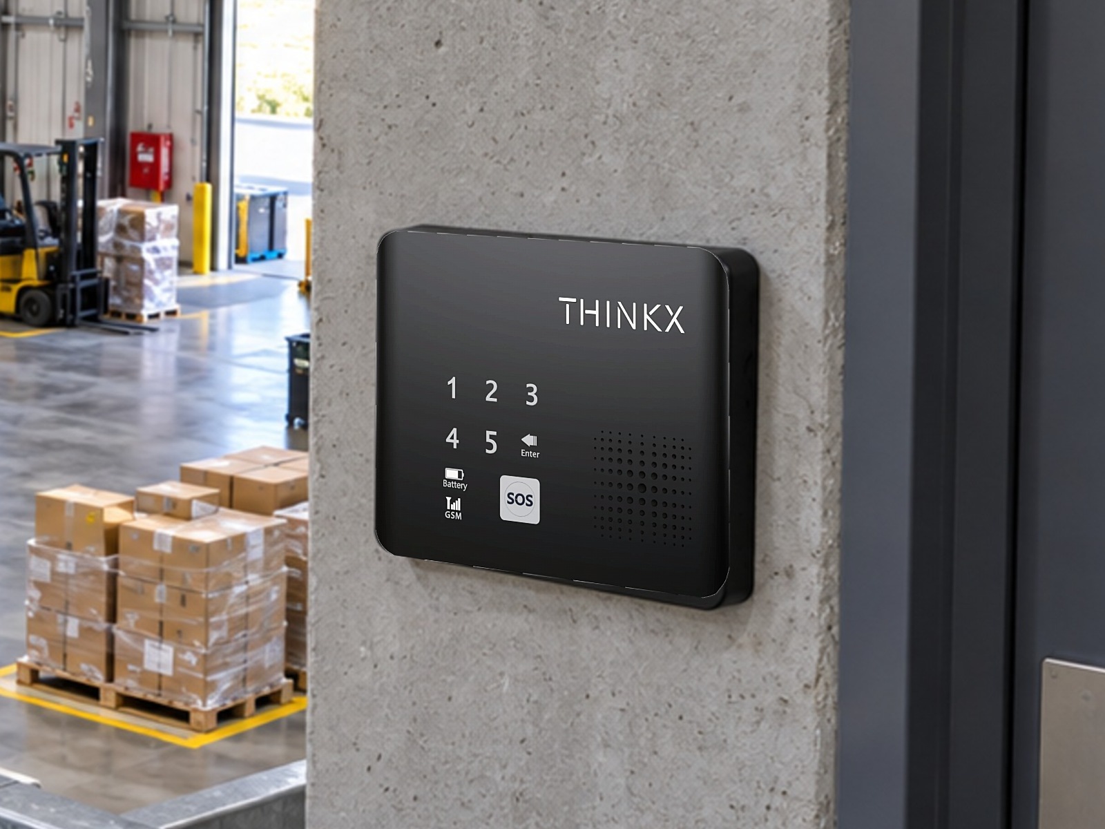 Xtouch Protect panel mounted on a concrete pillar overlooking a busy warehouse floor with loading bays